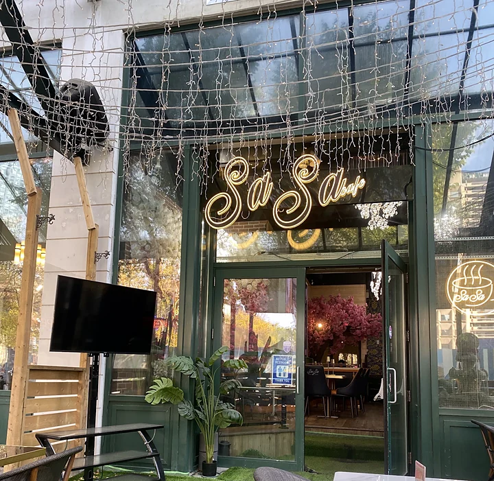 Sasa Cafe entrance with its gold sign